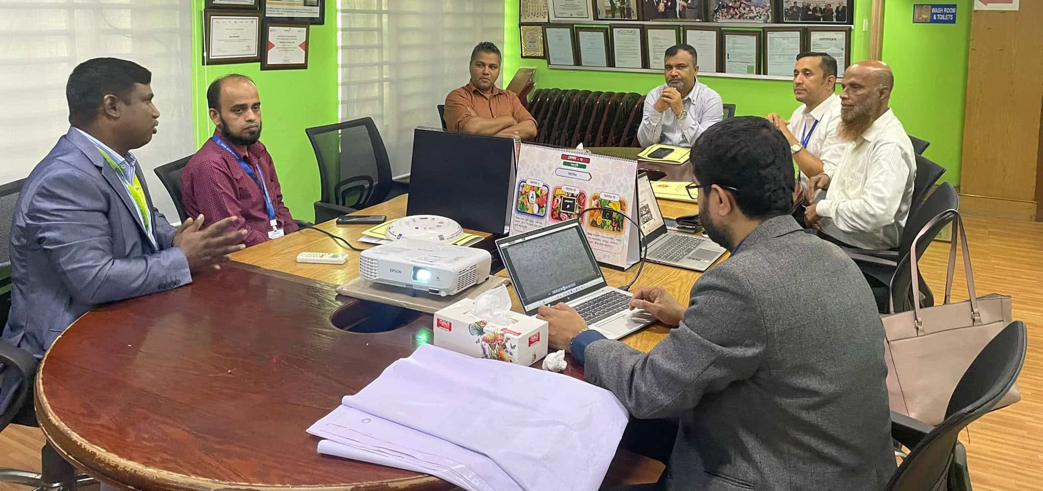 Business meeting on workforce nutrition and health strategies in Bangladesh.