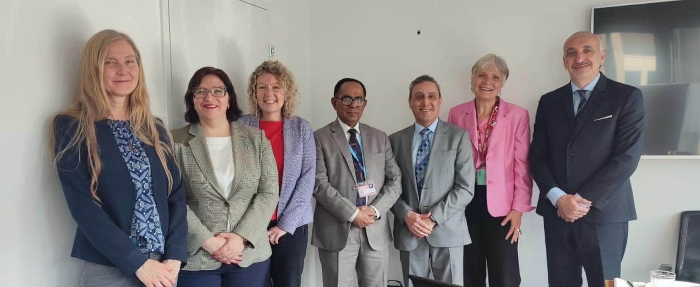 Diverse group of professionals at Workforce Nutrition Alliance meeting.